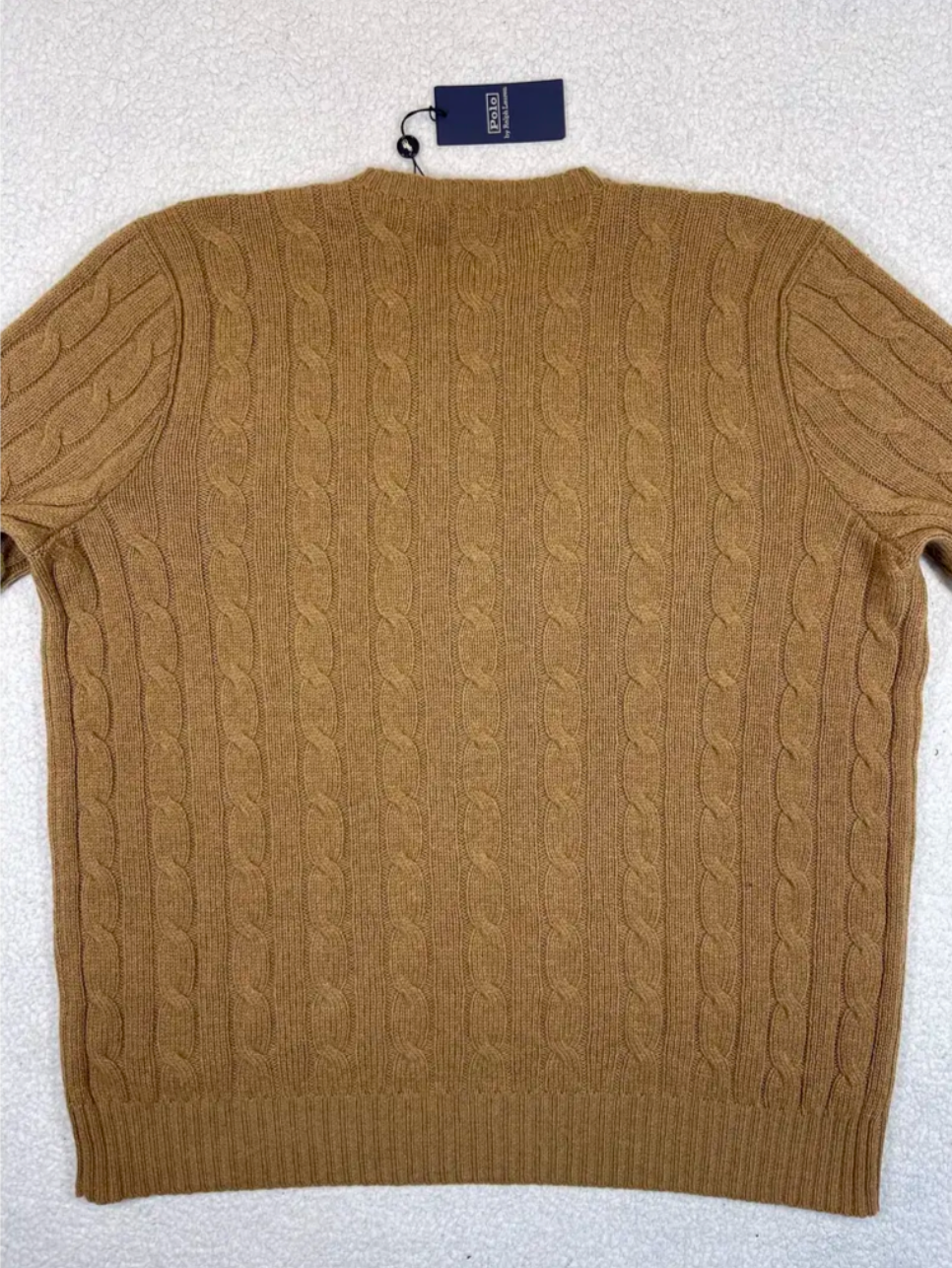 Pull emblématique en cachemire torsadé