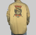 A tan long-sleeve shirt jacket shown from the back on a mannequin, featuring a large graphic print of a fisherman and the text 'River Guide' and 'Pine Ridge Bear Apparel' on the back, with brown elbow patches.